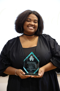 Jasmine Waiter-Reynolds receiving the Pinnacle Award